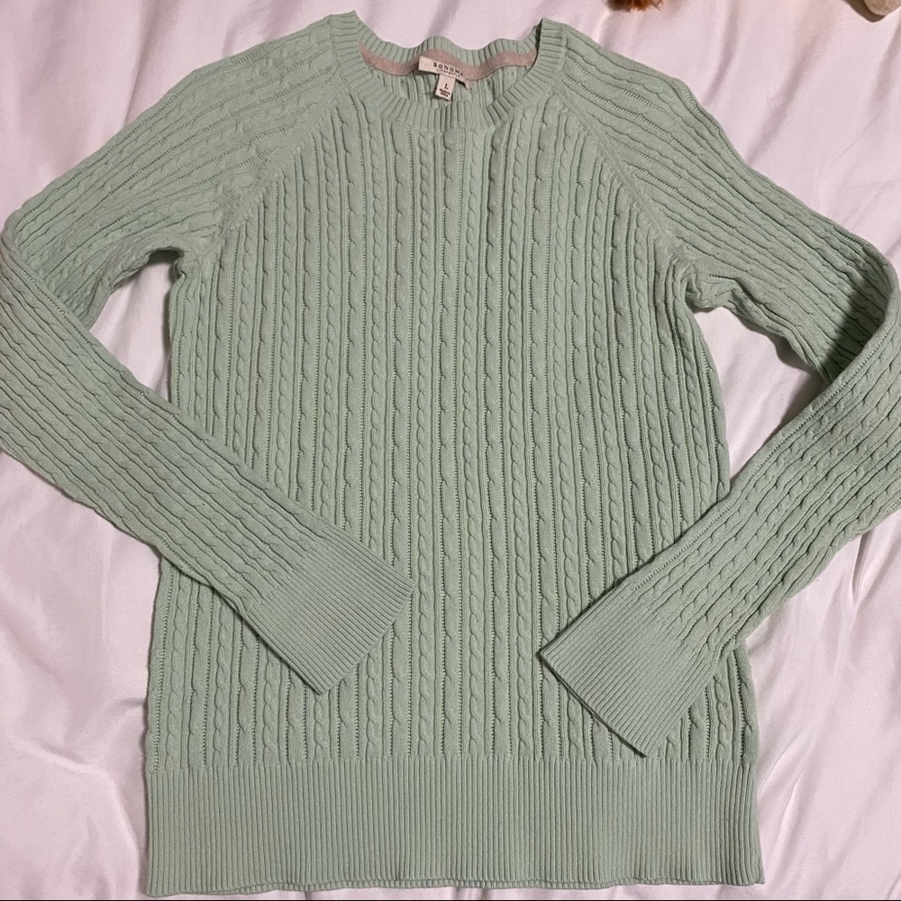 green cable knit sweater